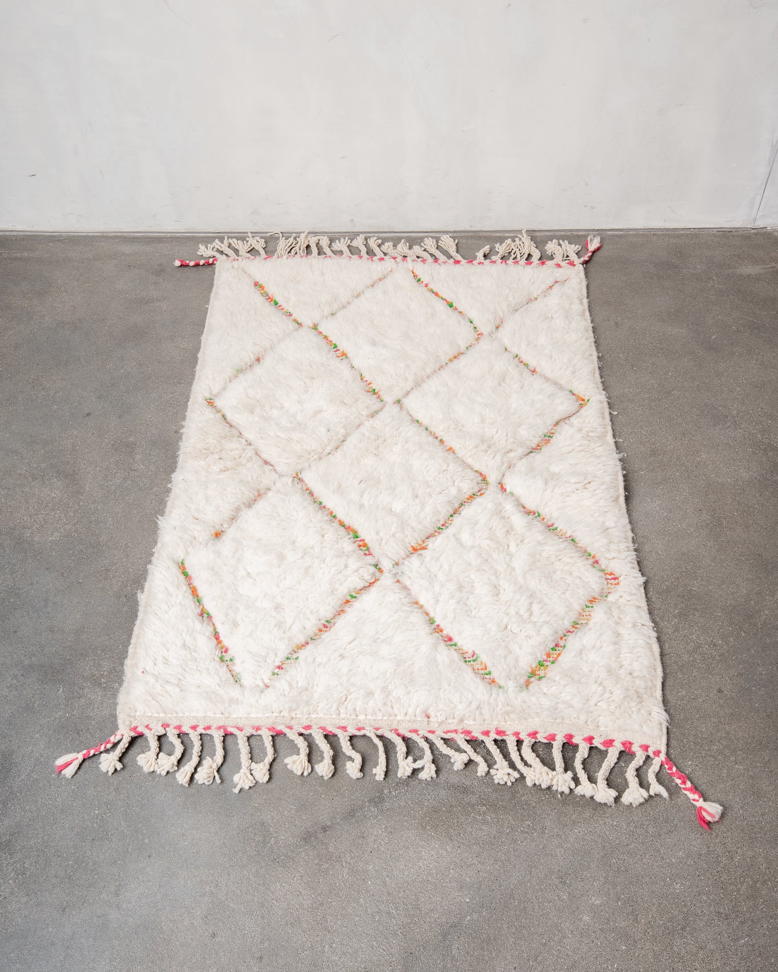 Modern, designer, handcrafted Berber rug from Morocco. Beniourain carpet with beautiful colours and patterns and fluffy wool texture.